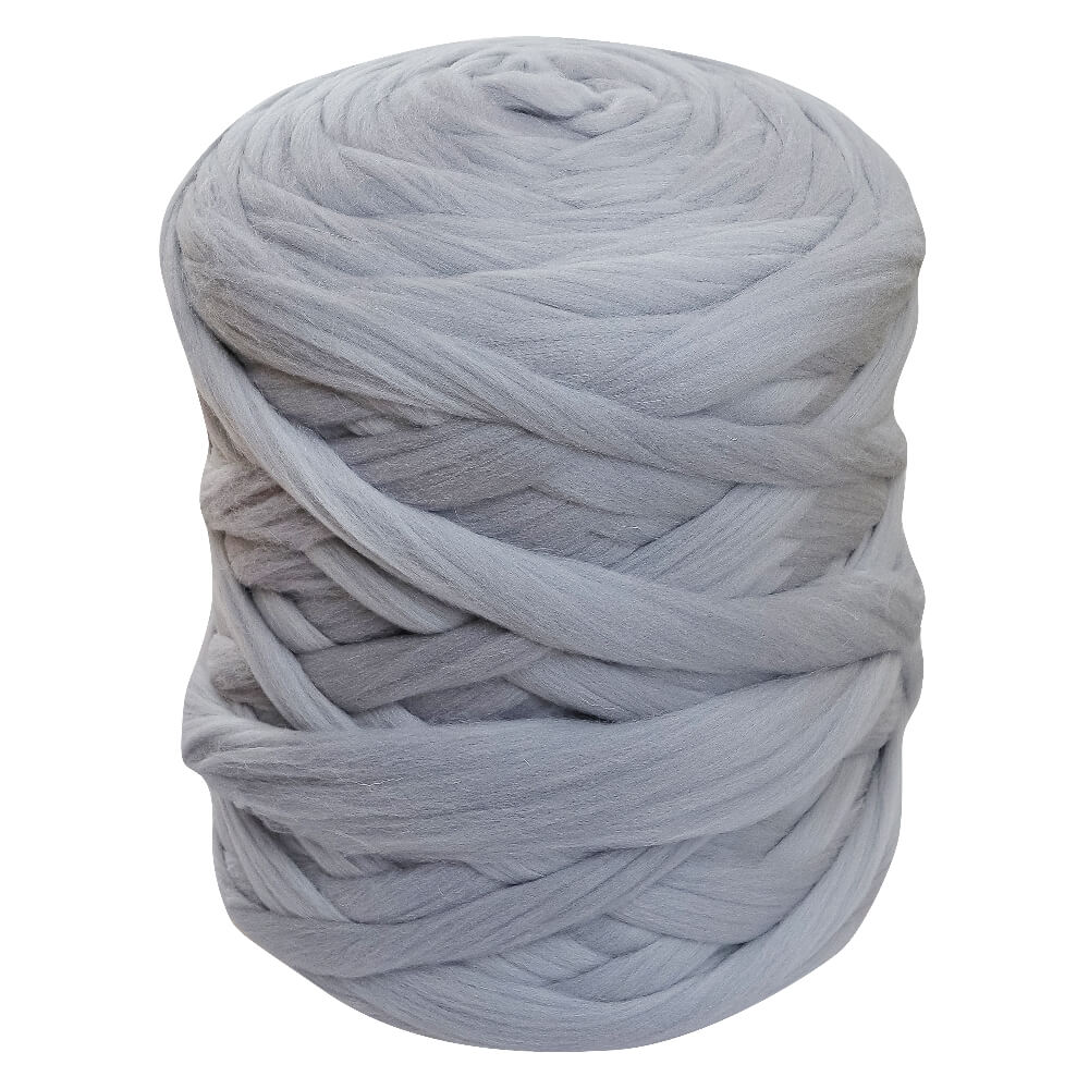 a ball of light grey sper chunky yarn for arm knitting