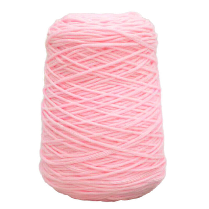 Pink acrylic tufting yarn on a white background