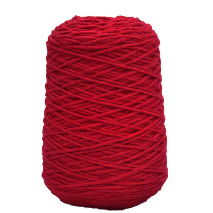 Red acrylic tufting yarn ball on a white background