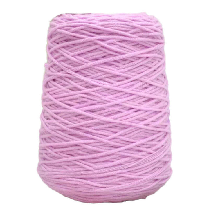 Pink acrylic tufting yarn on a white background