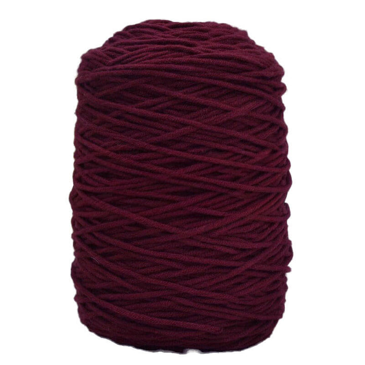 Maroon acrylic tufting yarn ball on a white background