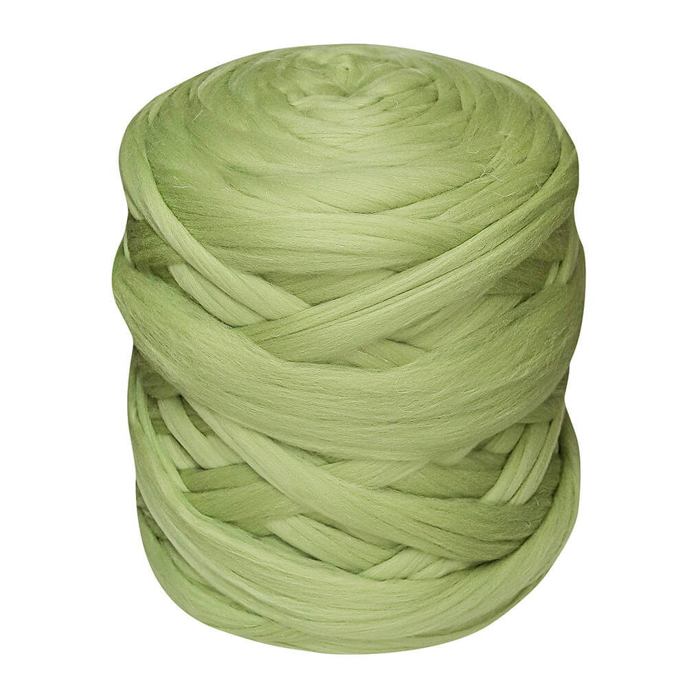 A bobbin of extreme knitting wool yarn in pistachio