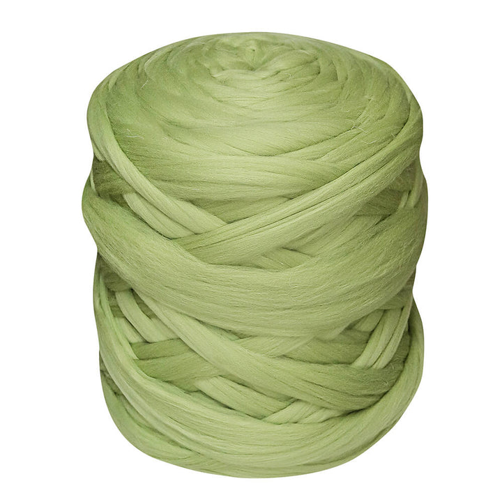 A bobbin of extreme knitting wool yarn in pistachio