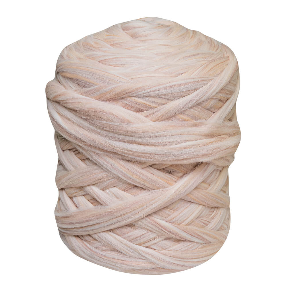 A big ball of seashell color chunky wool yarn for arm knitting