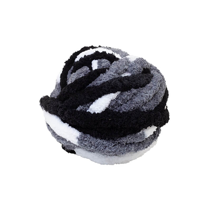 Plush ball yarn with black, gray, and white colors on a white background