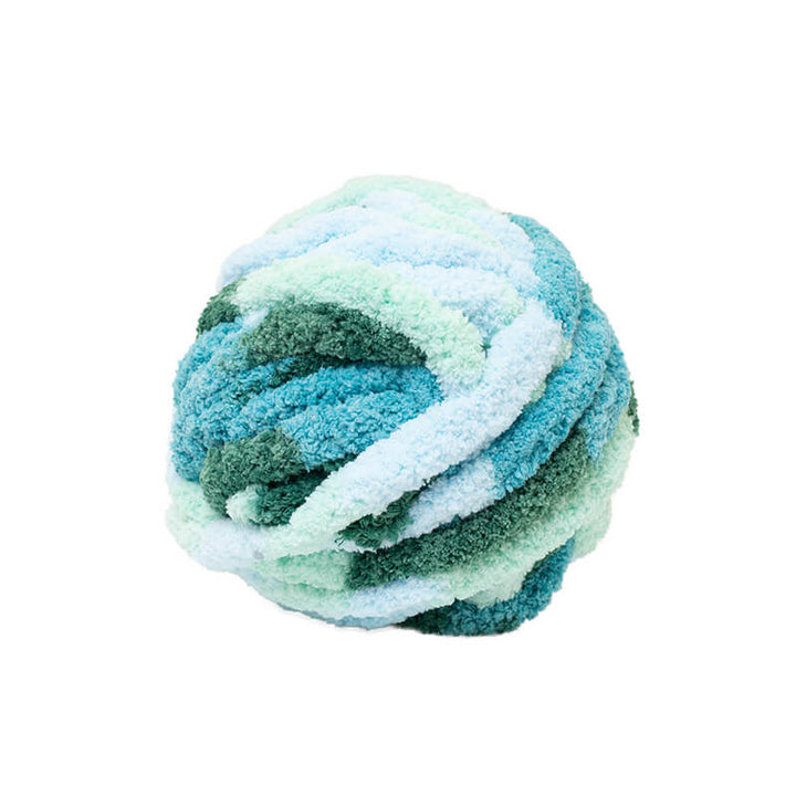 Ball of yarn with blue and green gradient on a white background