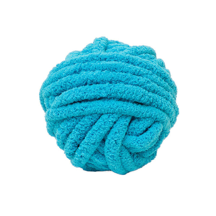 Blue bulky arm knitting chenille yarn ball on a white background