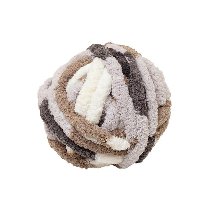 Textured ball with brown, beige, and white pattern on a white background